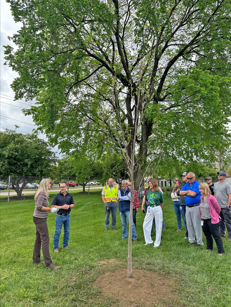 Bonnie Depew addresses her coworkers and friends during a ceremony honoring her for her many years of dedication to the environment.